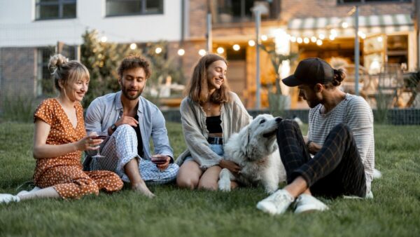 Friends gathered together to celebrate Dog Day - August 2024 social media calendar.