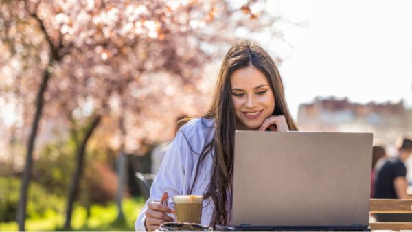 Marketer reading Dotdigital’s social media calendar for May 2024.